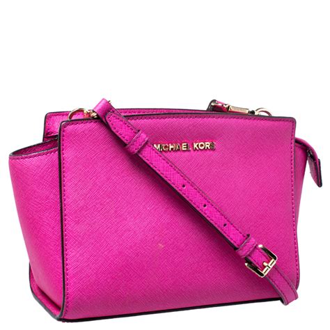 michael kors hot pink satchel|Michael Kors pink suitcase.